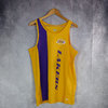 Camiseta sin mangas Los Ángeles Lakers wordmark. Amarilla.New Era