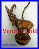 antico campanello in bronzo dorato stambecco