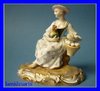 Meissen Porcelain Figure of a woman with hen and eggs