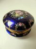 1880's enamel and gilt brass box painted with flowers