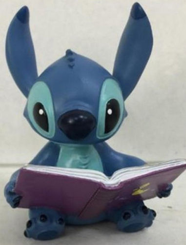 Figurine Disney Tradition Stitch avec livre 6 cm